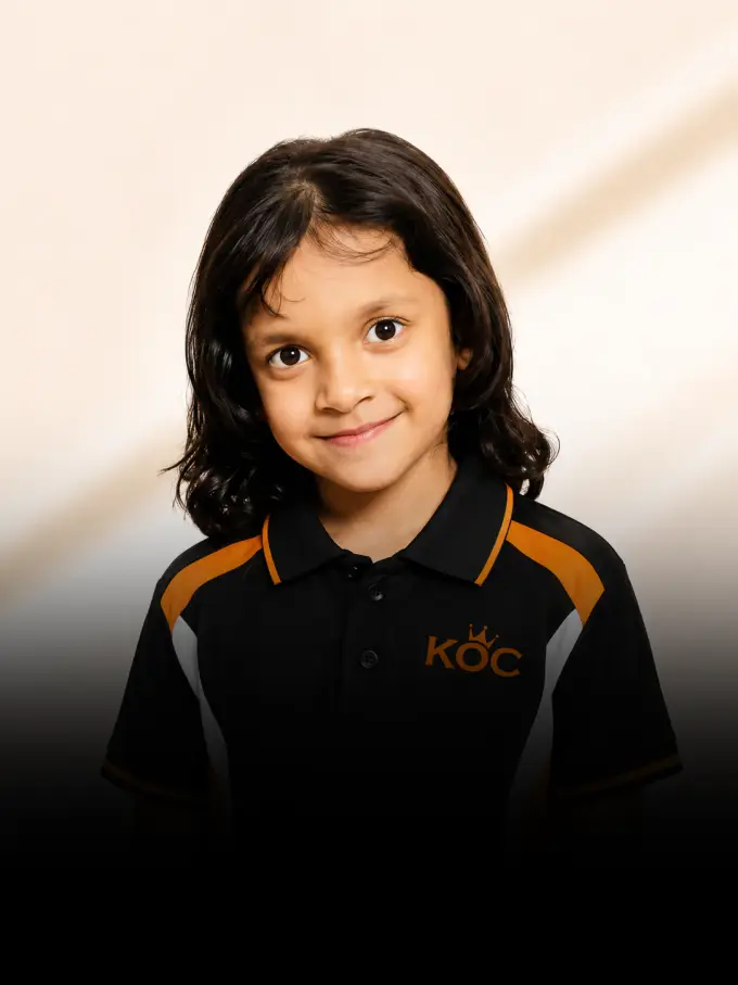 Kingdom of Chess student Poushita Paliwal holding her Under-7 trophy