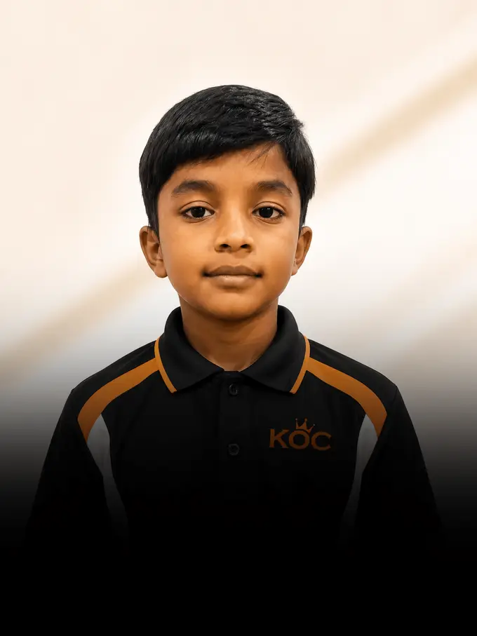 Kingdom of Chess student Rishaan Jain in the academy polo