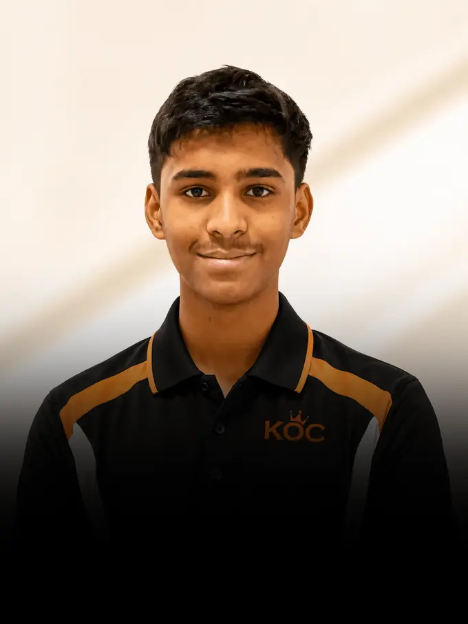 Kingdom of Chess student Yash Bharadia in the academy polo