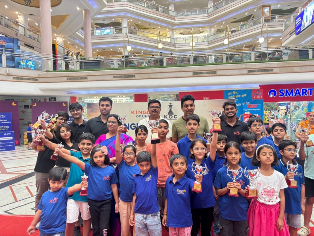 Children holding trophy